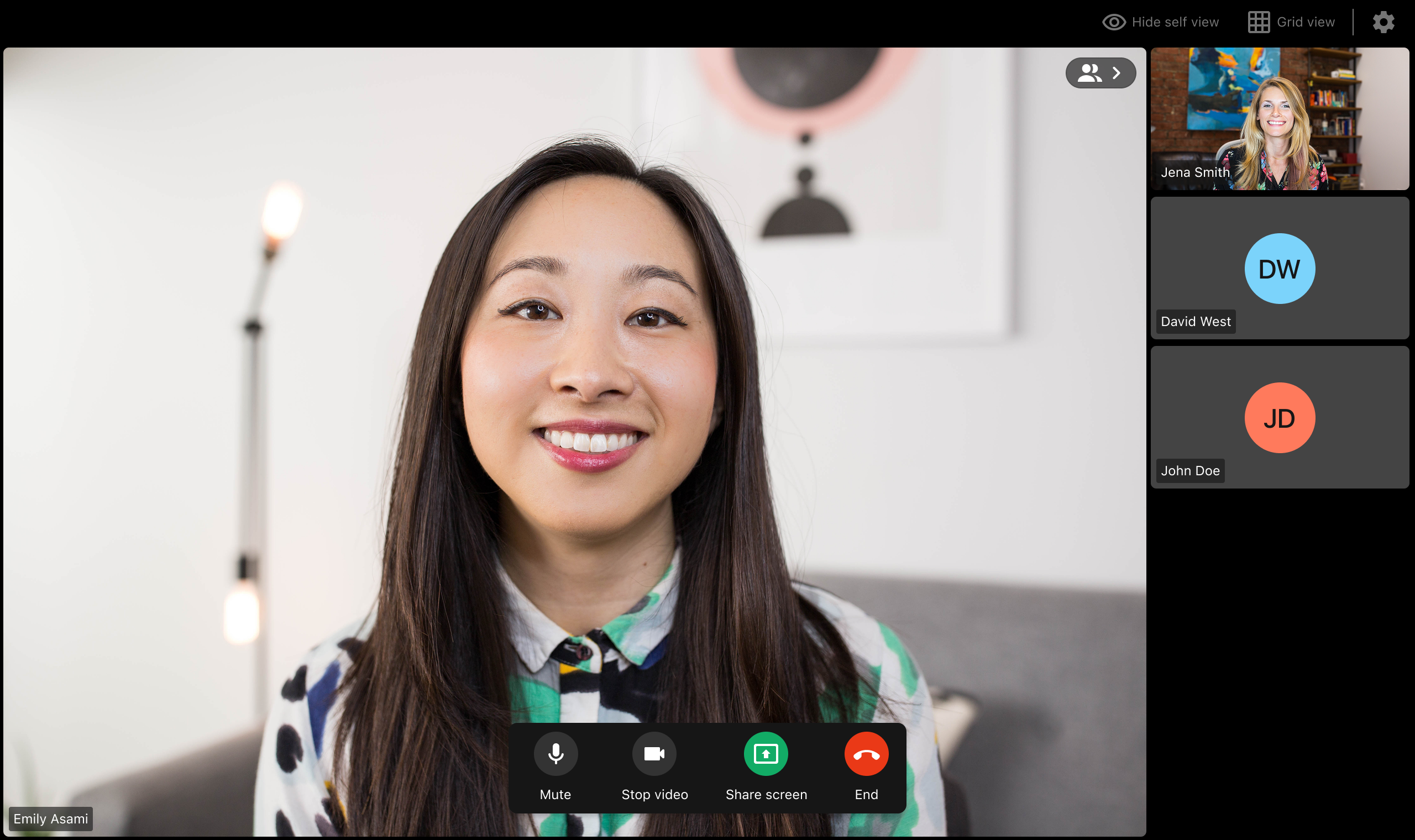 Web speaker view — the person speaking fills the frame, with the other participants stacked in a sidebar and a Hide self view toggle up top.